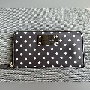 Great condition Kate Spade black with white polka dots, polyester fabric wallet.